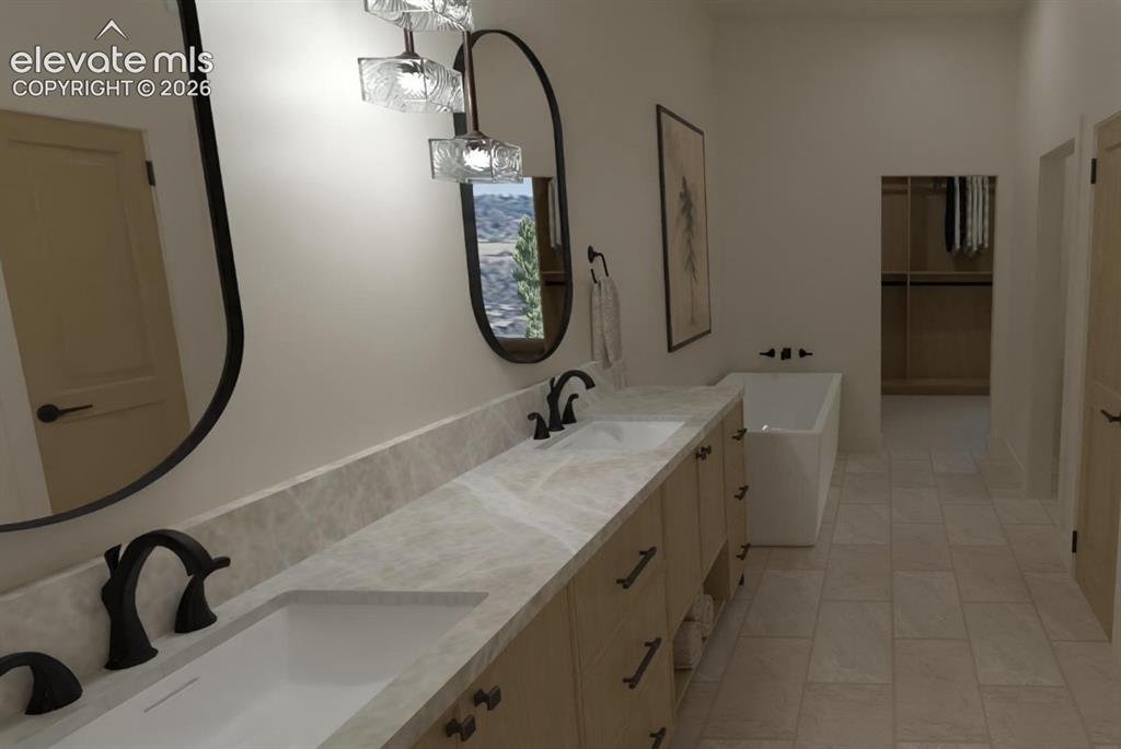Image 16 of 32: Dual vanity with undermount sinks, matte black fixtures, and stone countert