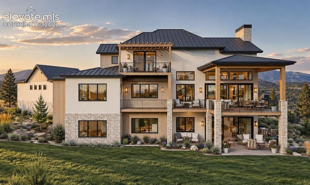 Image 3 of 32: Multi-level rear exterior featuring extensive outdoor living spaces