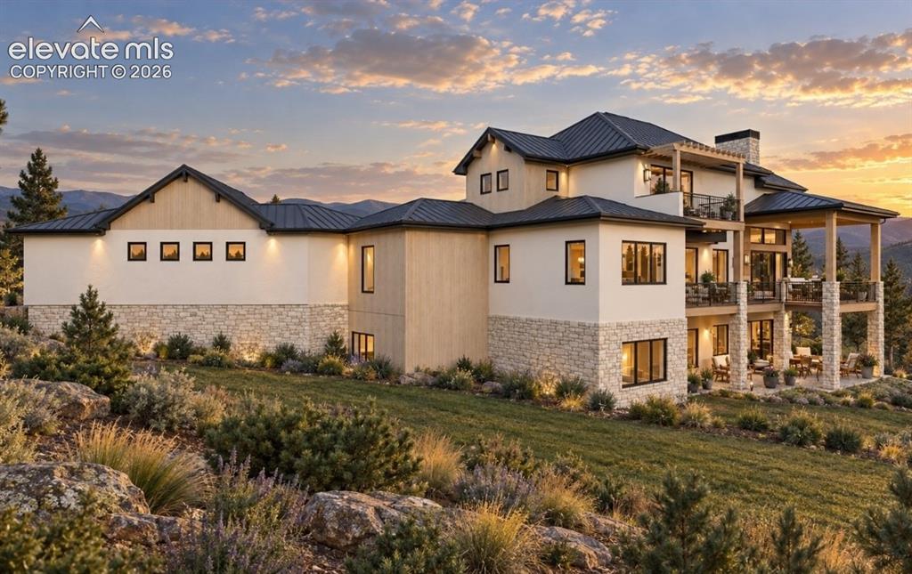 Image 4 of 32: Hill Country Contemporary architectural design featuring a metal roof, ext
