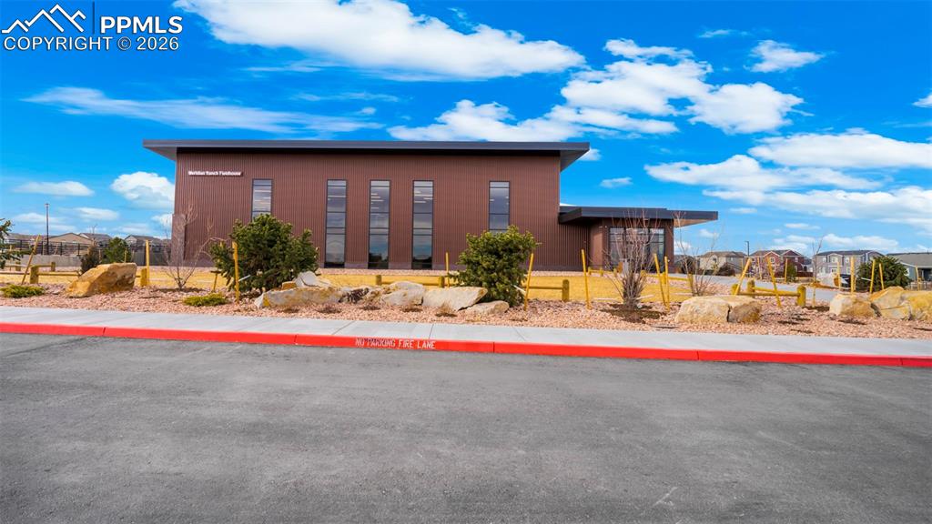 Image 2 of 43: View of property exterior featuring a residential view