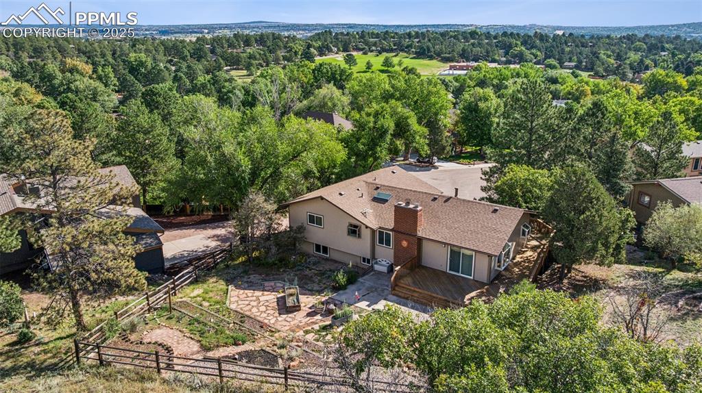 Image 29 of 34: Open Space above and behind the home