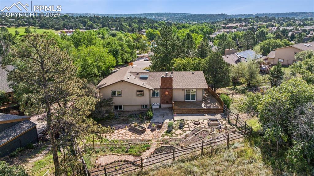 Image 3 of 34: From behind the house showing the big deck
