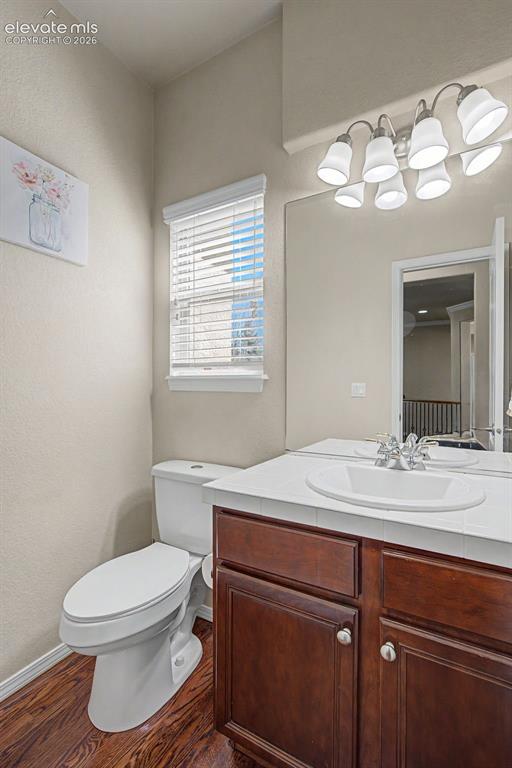 Image 16 of 39: Main level powder room pre new counters