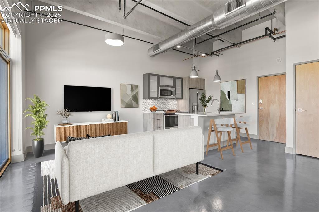 Image 3 of 22: Top-floor loft combines modern finishes with industrial design. Virtually S