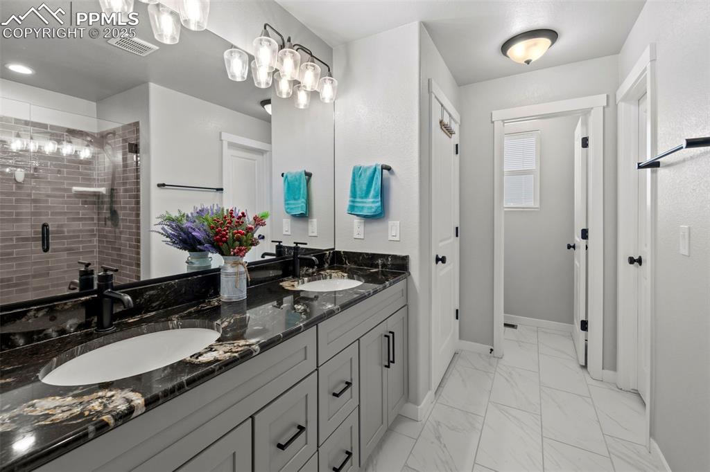 Image 23 of 50: Master Bathroom