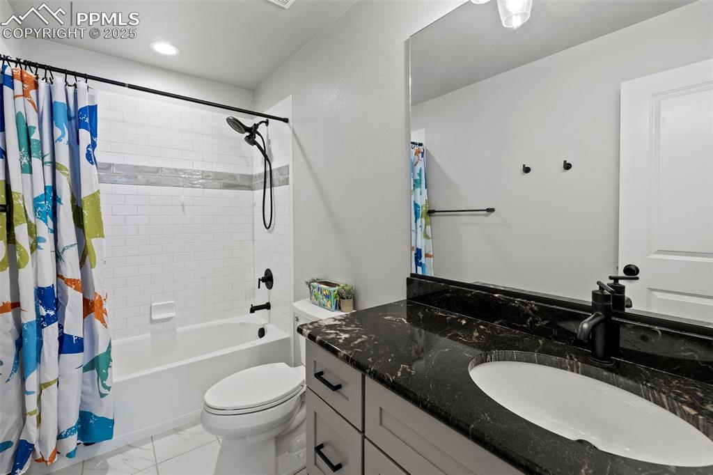 Image 35 of 50: Hall bath upper level