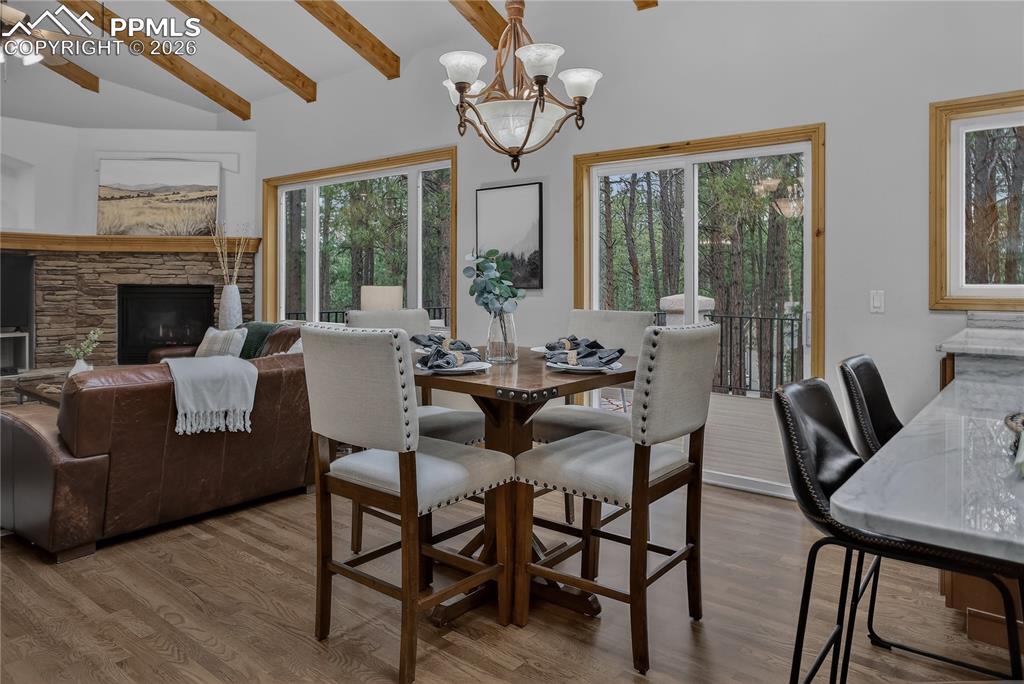 Image 13 of 48: Plenty of dining options with easy access to the large composite deck