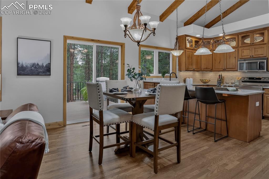 Image 14 of 48: Hardwood floors extend throughout the main level