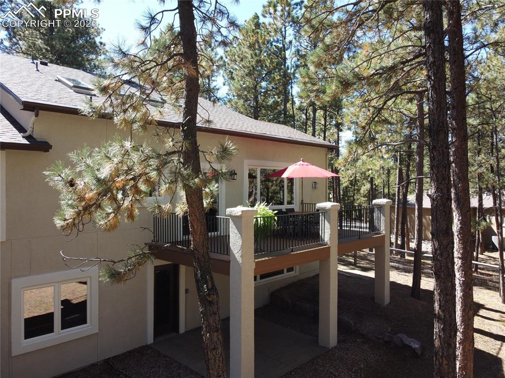 Image 39 of 48: Walk-out from the main-level to a private deck, or from the lower level to 