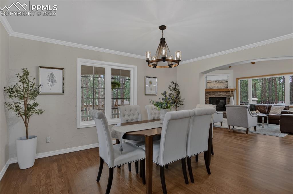 Image 6 of 48: Formal Dining Room with recently refinished hardwood flooring