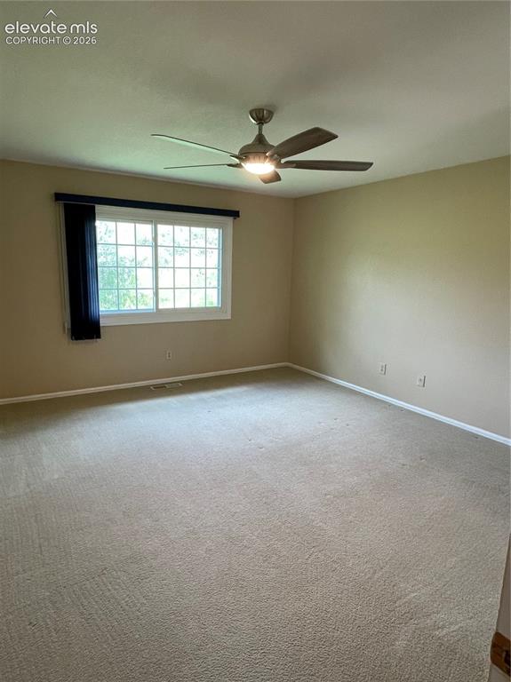 Image 11 of 25: 1st of two bedrooms upstairs