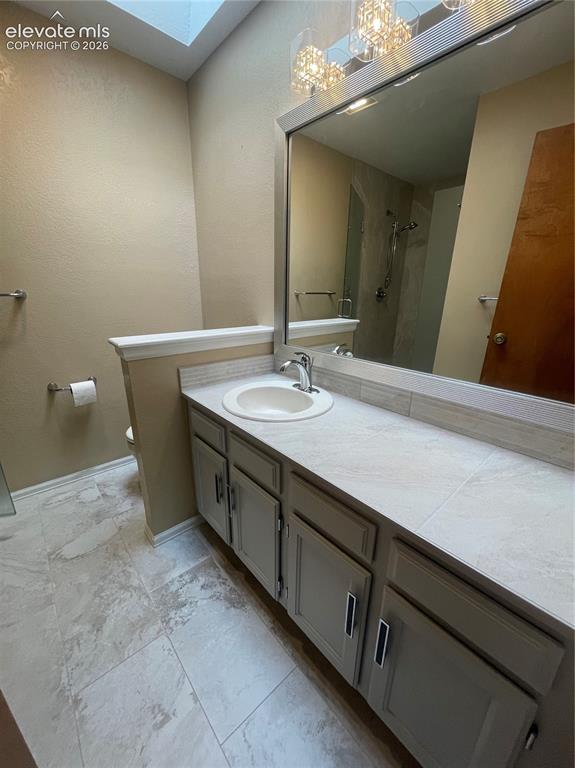 Image 14 of 25: 1st bed bathroom