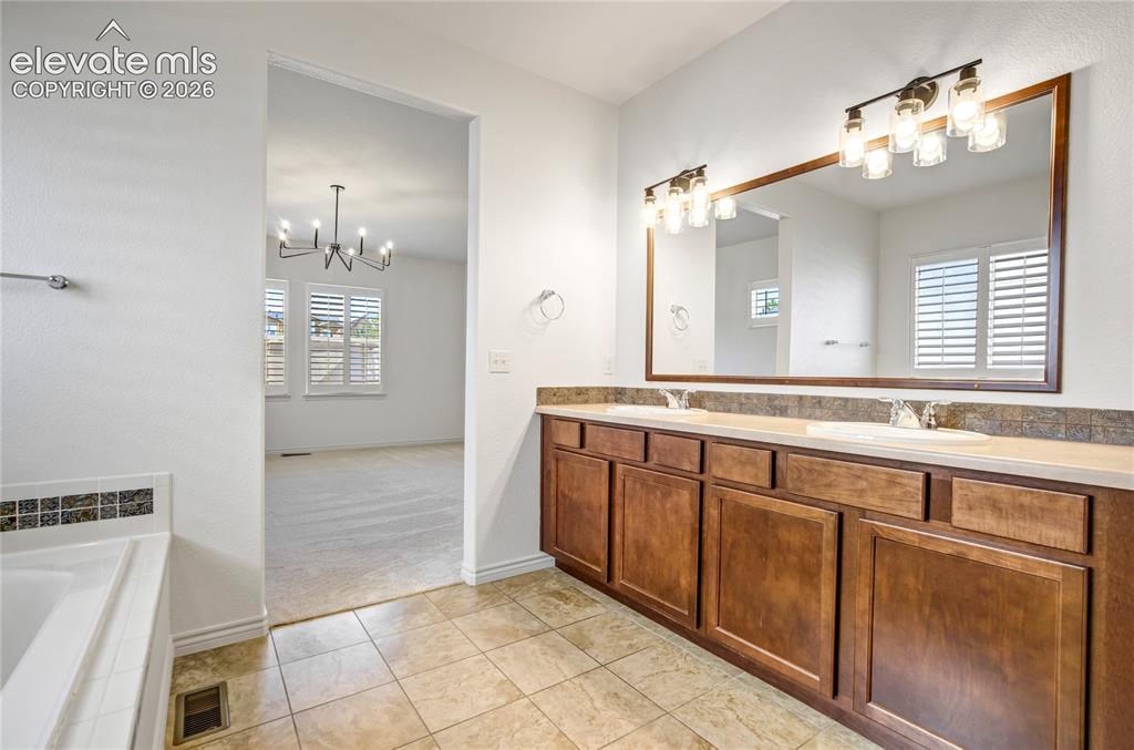Image 21 of 50: Master Bathroom