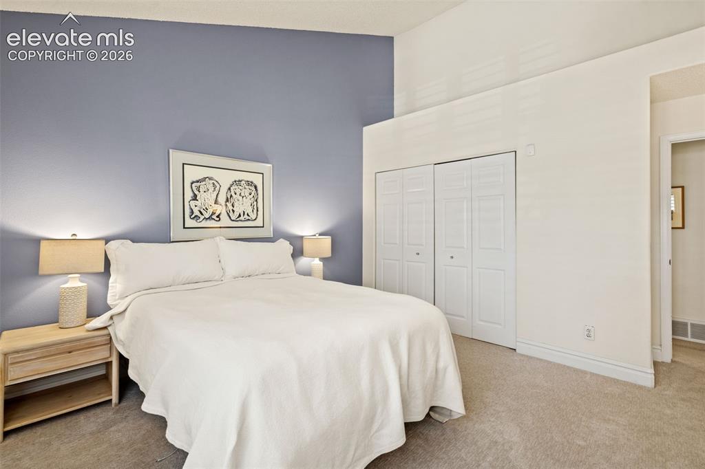 Image 18 of 28: Master Bedroom