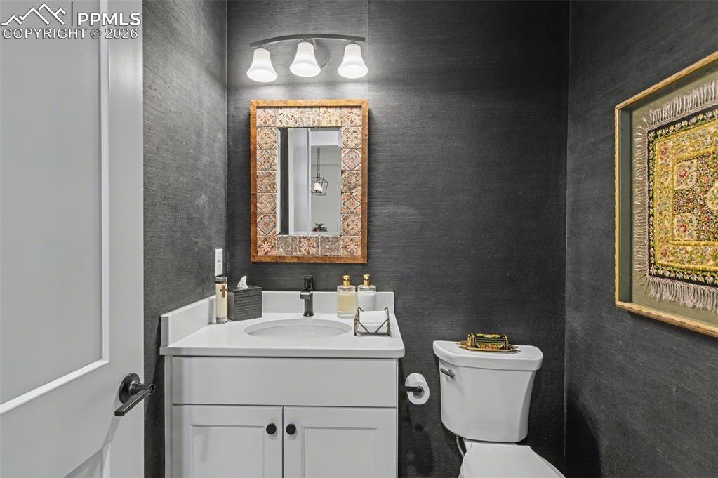 Image 22 of 50: Your guests will appreciate the sophisticated main-level powder room, perfe