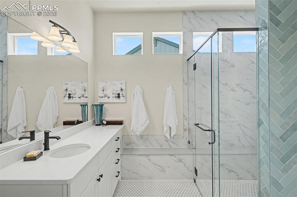 Image 28 of 50: The primary bathroom