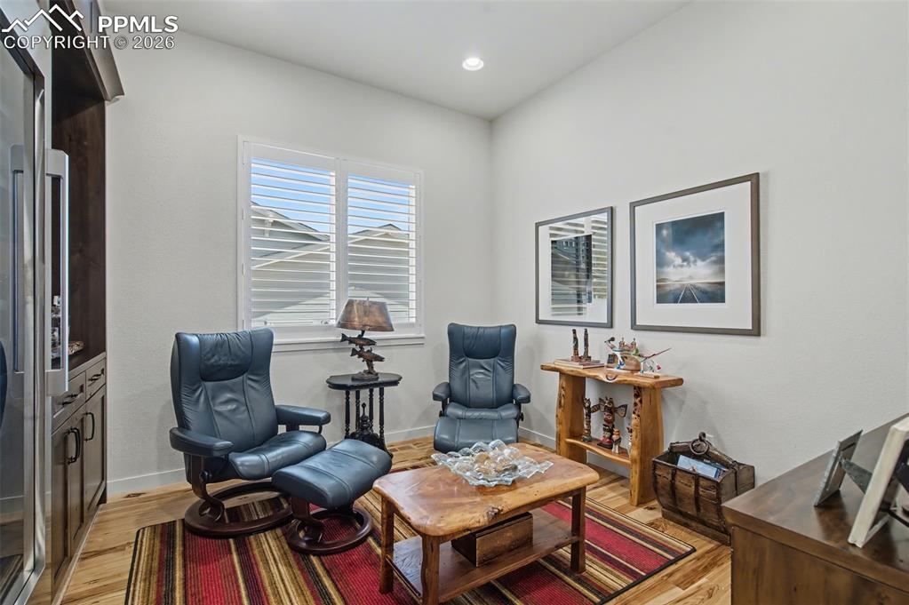 Image 34 of 50: This versatile main-level room provides the perfect tranquil space to read,