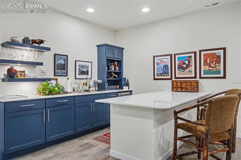 Image 39 of 50: Gather around the basement