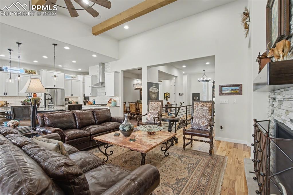 Image 8 of 50: The open-concept design perfectly unites the great room and gourmet kitchen