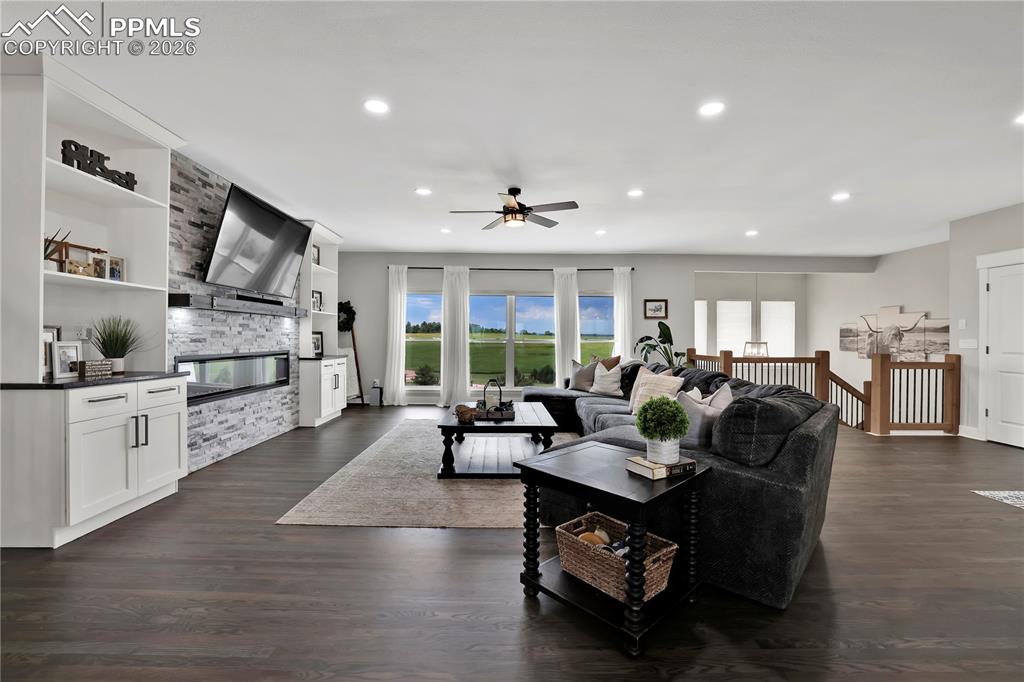 Image 14 of 46: Large Windows, Real Hardwood, Modern finishes that feel cozy, what more cou