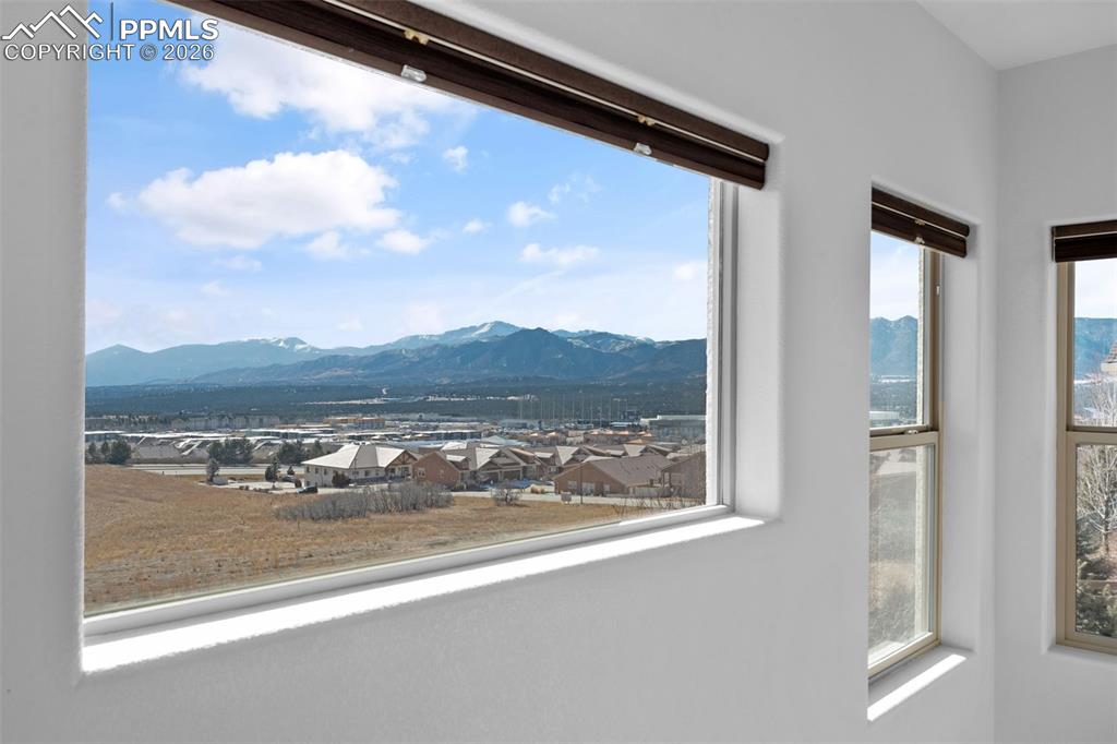 Image 20 of 48: View of mountain backdrop featuring nearby suburban area