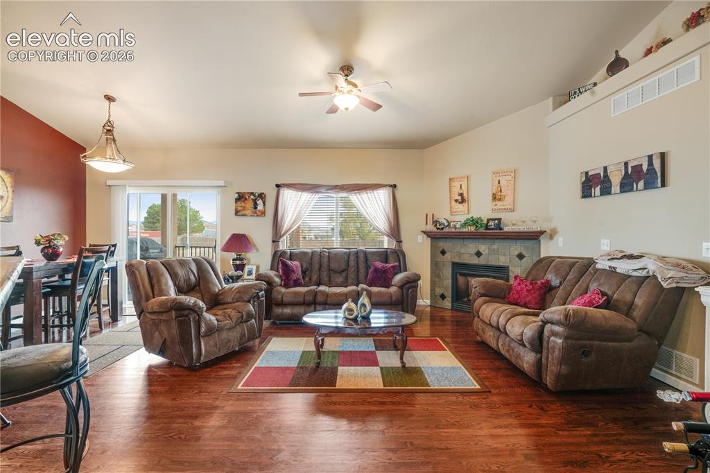 Image 10 of 25: Great room with fireplace and walkout!