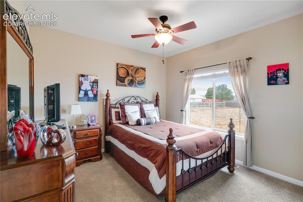 Image 15 of 25: 2nd main level bedroom with walk in closet