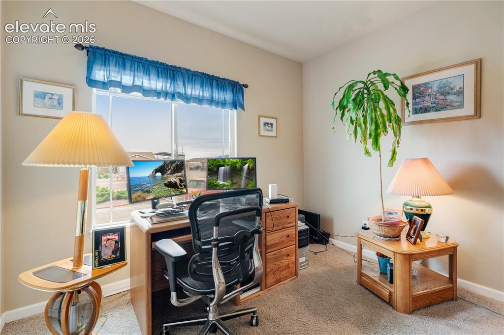 Image 16 of 25: Office/bedroom
