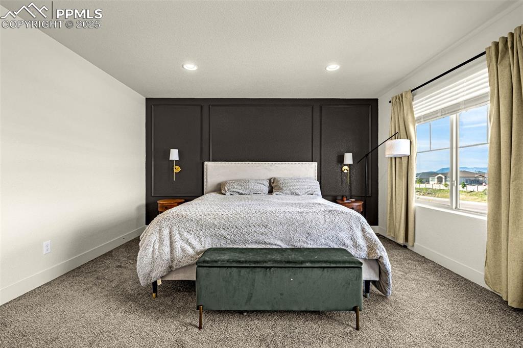 Image 13 of 32: Carpeted bedroom with recessed lighting and baseboards