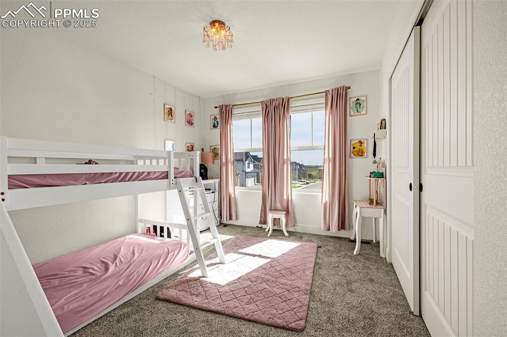 Image 23 of 32: View of carpeted bedroom