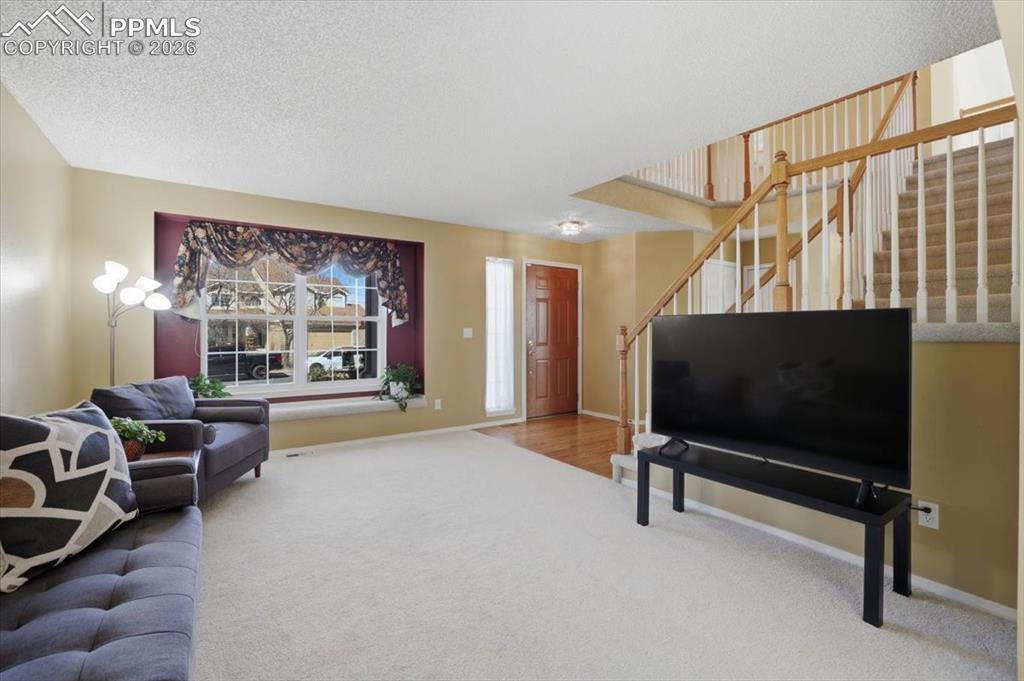 Image 10 of 48: Formal living room.