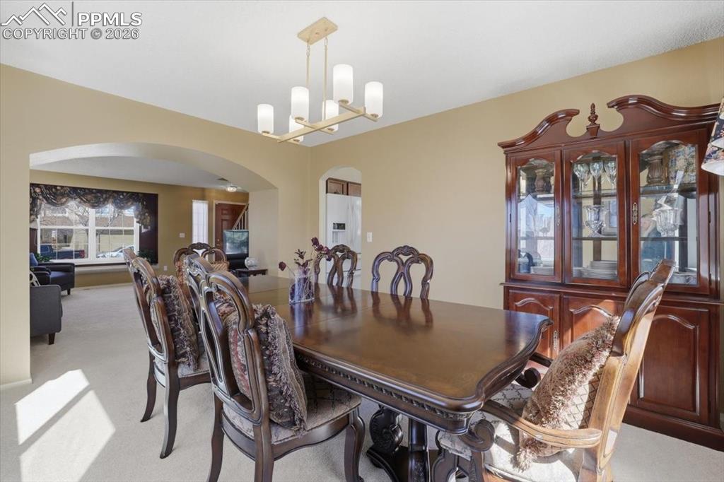 Image 11 of 48: Formal dining room.