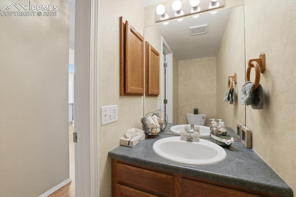Image 19 of 48: Main level guest bathroom.