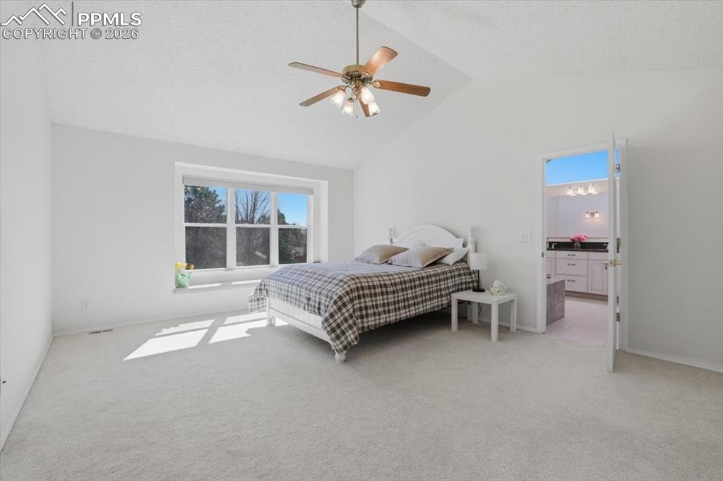 Image 23 of 48: Primary suite with attached bathroom.