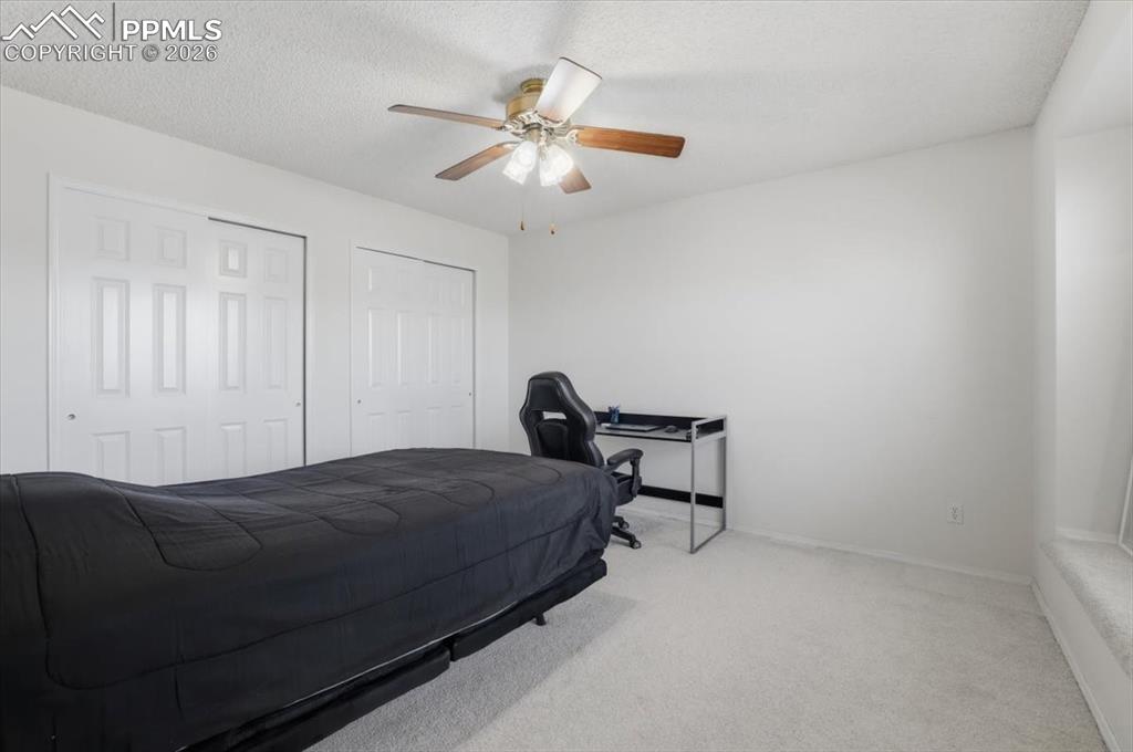 Image 34 of 48: 4th upper level bedroom.