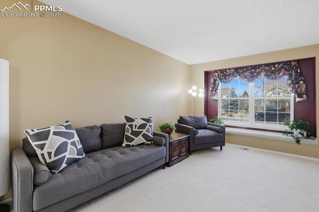 Image 8 of 48: Formal living room.