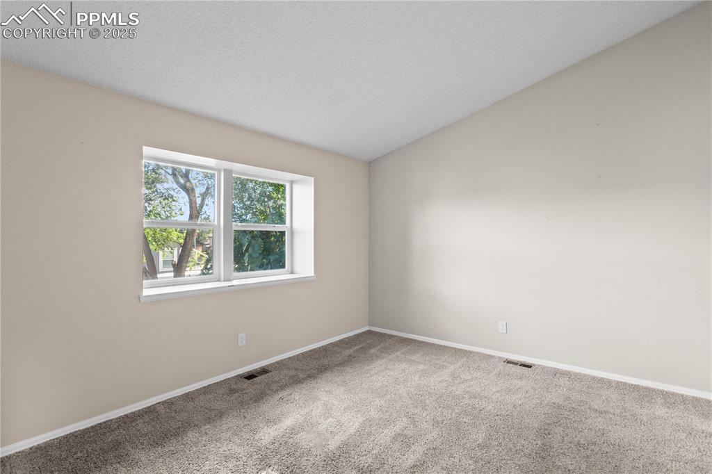 Image 16 of 33: Bedroom