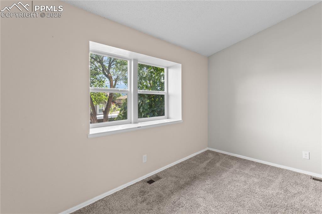 Image 17 of 33: Bedroom