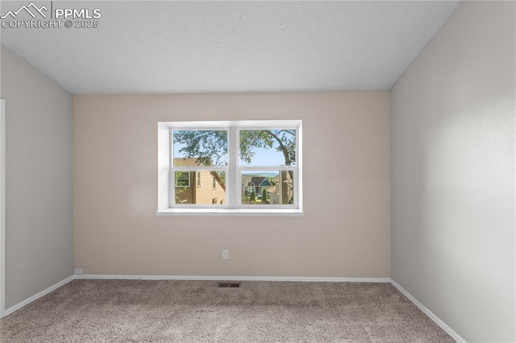 Image 18 of 33: Bedroom