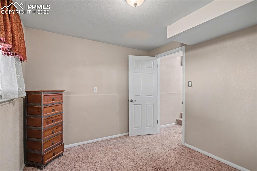 Image 18 of 28: Bedroom