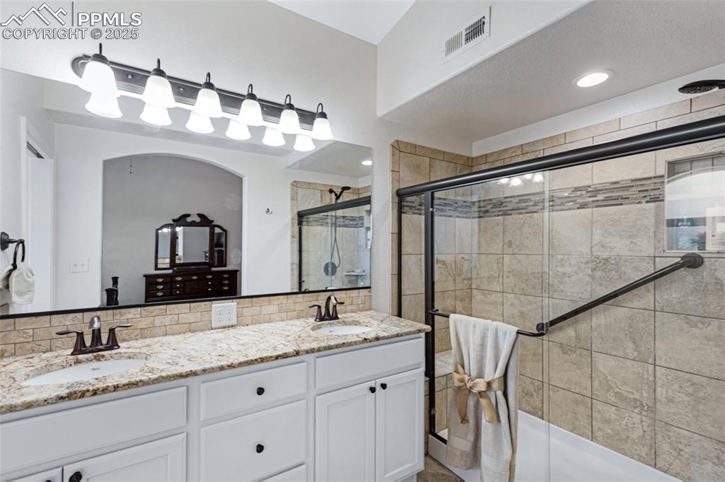 Image 22 of 41: Master bathroom 