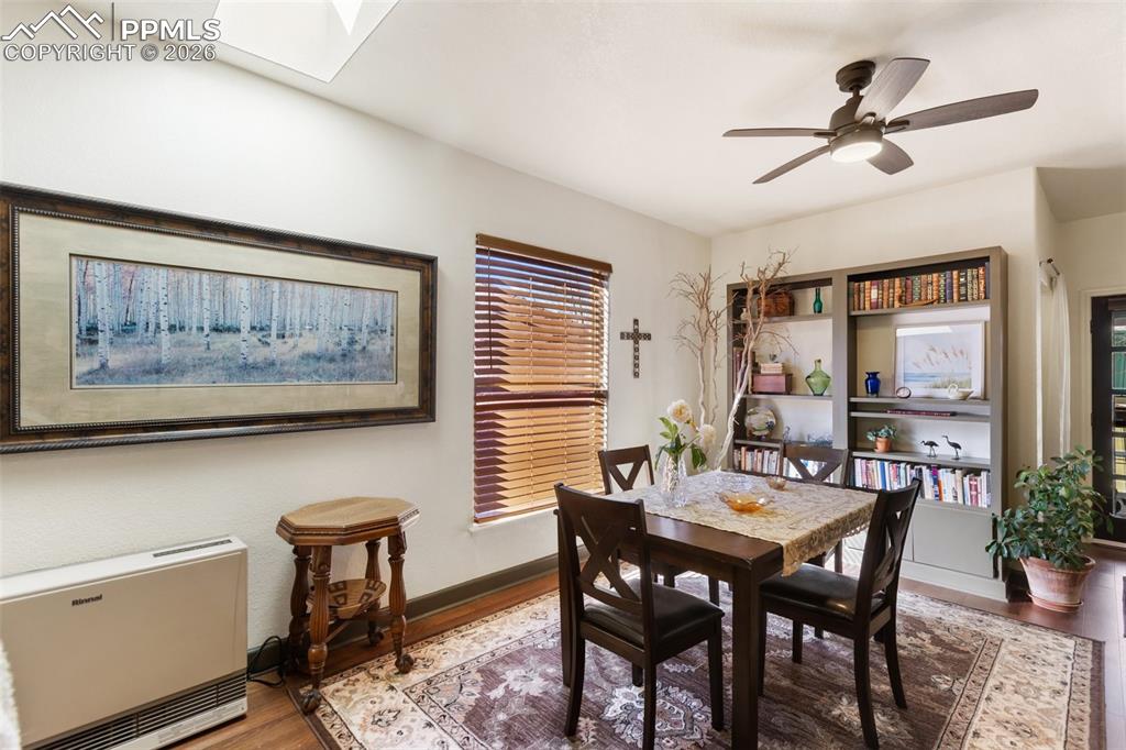 Image 10 of 37: Living room flow into the dining space.