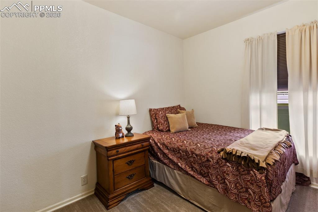 Image 20 of 37: Secondary bedroom with new carpet.