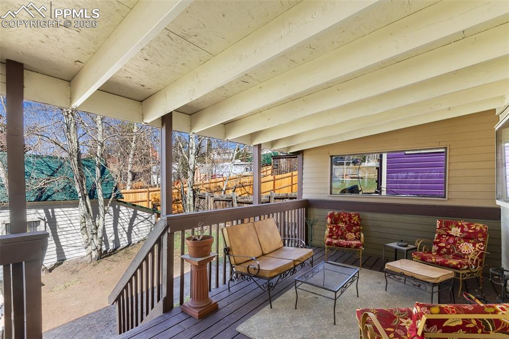 Image 31 of 37: Full bath with old world vanity and sink. 