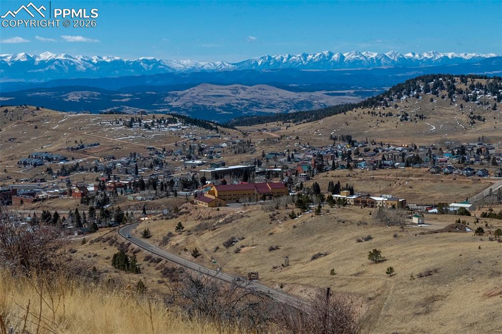 Image 37 of 37: Wood deck with walkout from the kitchen. Well maintained. Great space for e