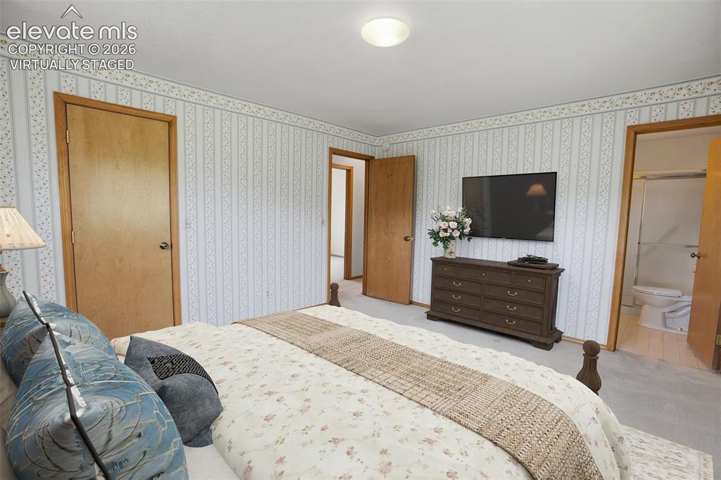Image 10 of 36: Master Bedroom -Virtually Staged