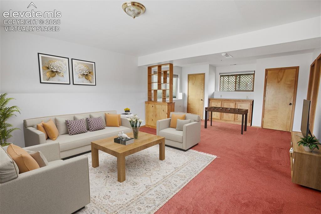 Image 17 of 36: Lower Level Family Room -Virtually Staged