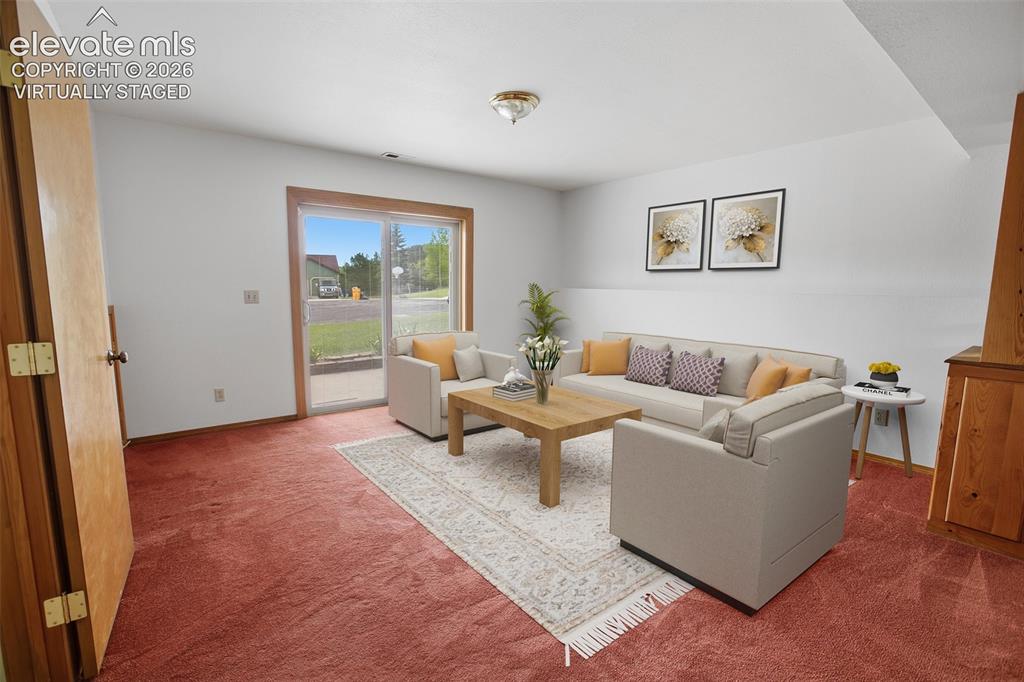 Image 19 of 36: Lower Level Family Room -Virtually Staged