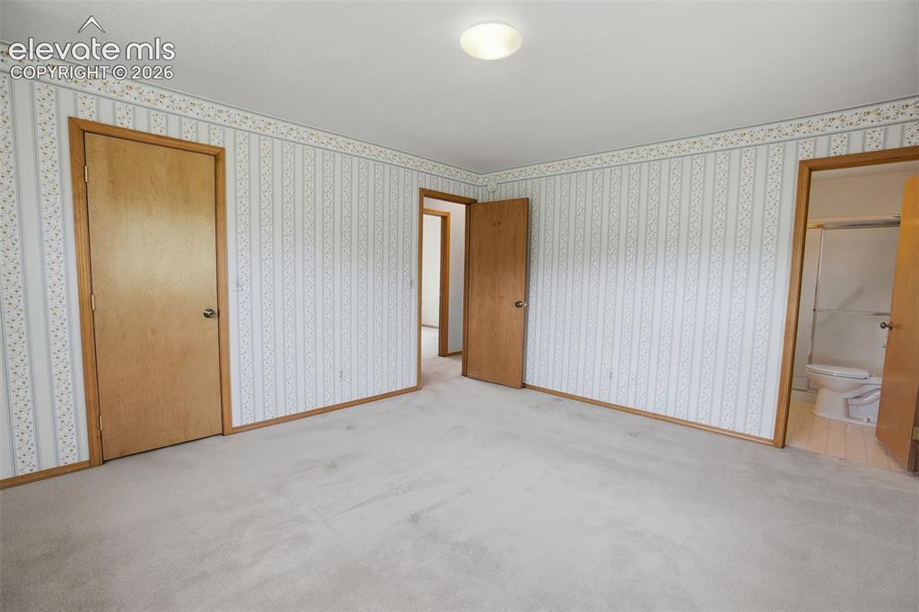 Image 29 of 36: Master Bedroom