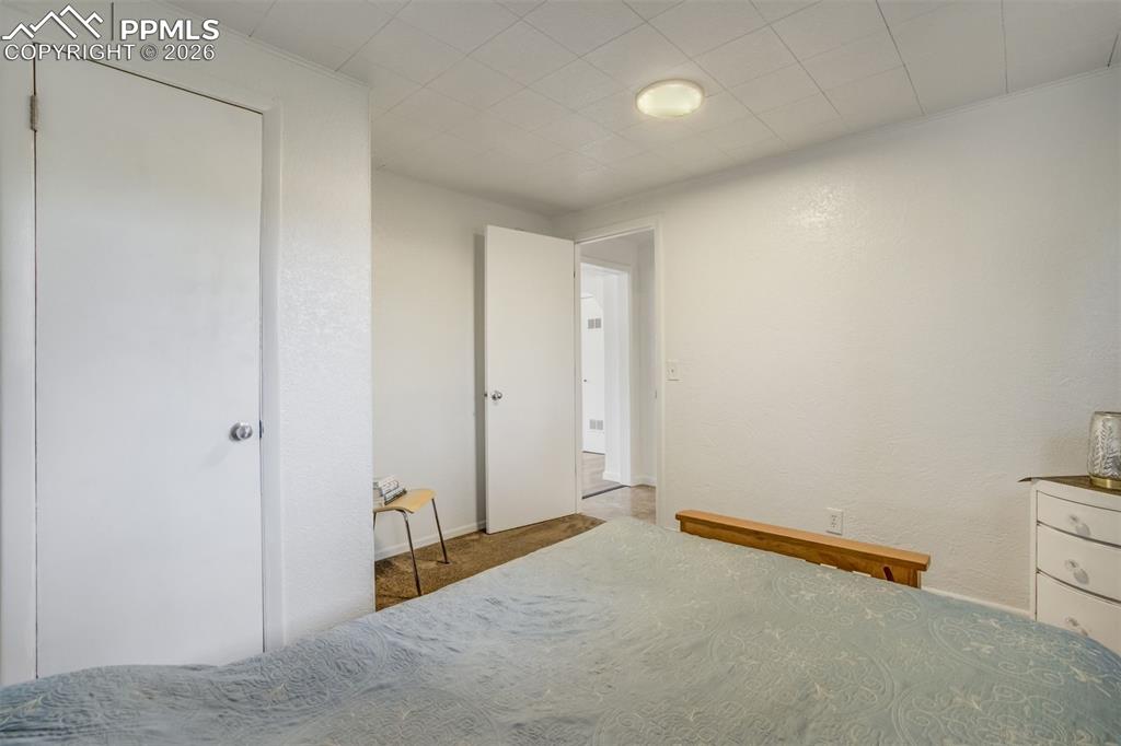 Image 34 of 44: Downstairs bedroom